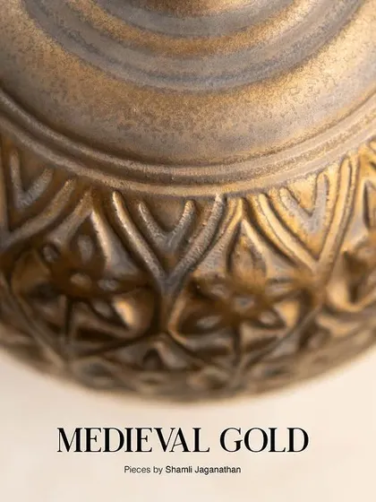 A close up look at the antique gold finish of our Medieval Gold glaze. Notice how it settles into the carved textures, creating depth and highlighting the craftsmanship of the piece.