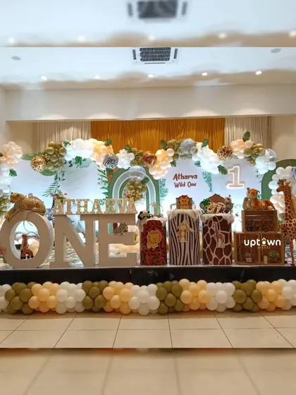 Another view of the large stage setup for a "Wild One" jungle party.