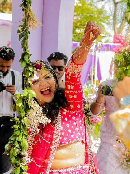 The bride's triumphant and joyous scream during her Haldi ceremony. It's these unfiltered expressions of happiness that I work to create and capture.