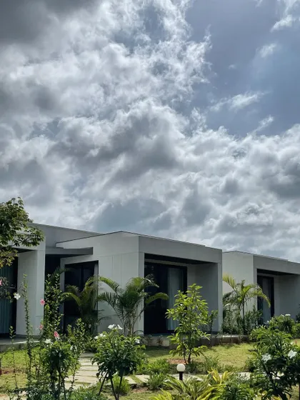 It’s a great feeling to see a project basking in the daylight. This view of "Nisarg" shows how the simple, modern forms interact with the natural landscape.