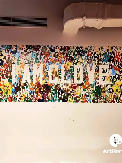 A collaborative wall art piece for Clove, where employees added their own handprints around the company name. This is a fantastic way to create a sense of team unity and shared ownership of the space.