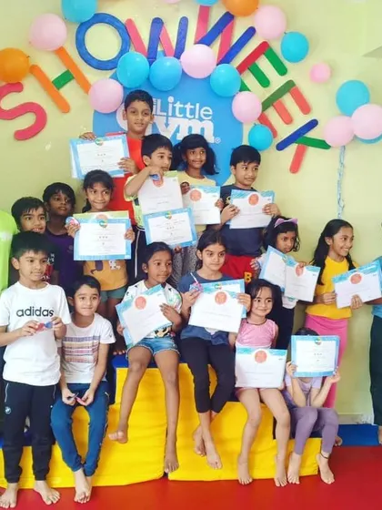 Photos from our "Show Week 2020," where students proudly display their certificates of achievement. It's a wonderful celebration of their hard work and progress.