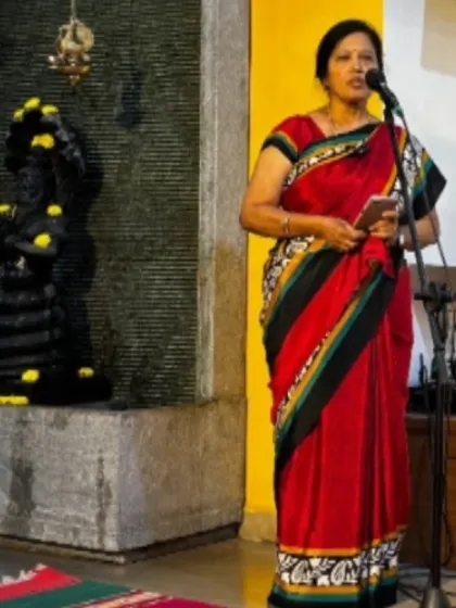 A speaker addressing the audience during our Yoga Vichara series, fostering an environment of learning and discussion.