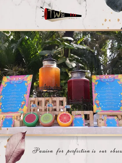 Another angle of our colorful mocktail bar, showcasing the custom menus and fresh juice dispensers.