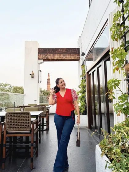 This outfit, seen here on a rooftop with a view of the Qutub Minar, is perfect for a stylish day out in Delhi.