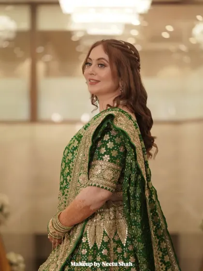 A candid moment of pure happiness from an engagement celebration. I created this soft glam look with radiant skin and gentle contouring to complement her beautiful green lehenga, ensuring she looked and felt effortlessly elegant.