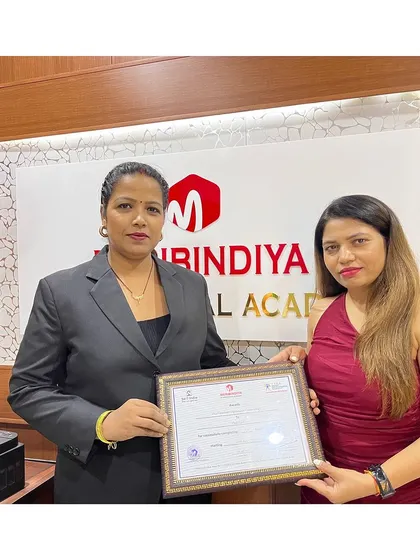 A proud moment for this student, who has successfully completed her training at the academy.