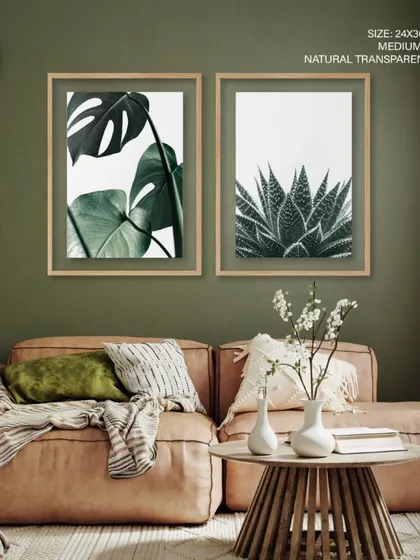 Our set of two Monstera and Succulent prints, framed with natural transparent frames against a deep green wall. This combination enhances the botanical theme and creates a rich, layered look.