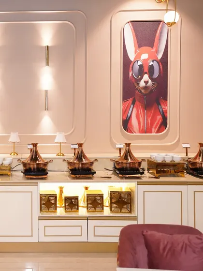 A look at our elegant buffet setup, featuring copper serving dishes and stylish decor. We believe the dining experience should be a feast for the eyes as well as the stomach.