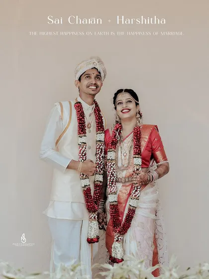 A classic wedding portrait of the happy couple, Sai and Harshitha, in their beautiful traditional attire.