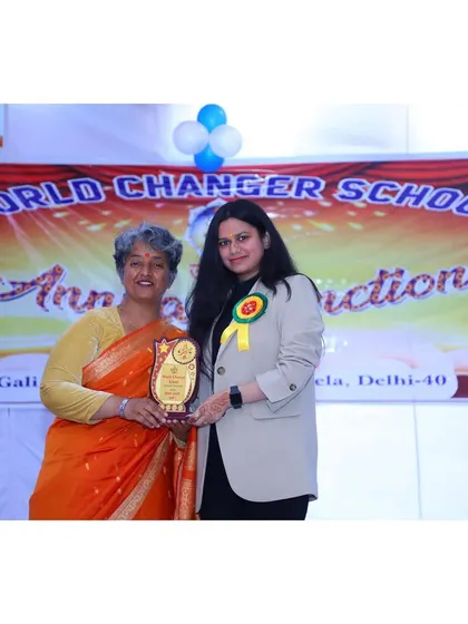 Receiving a memento at the school event. Moments like these reinforce my commitment to being a positive force both inside and outside the courtroom.