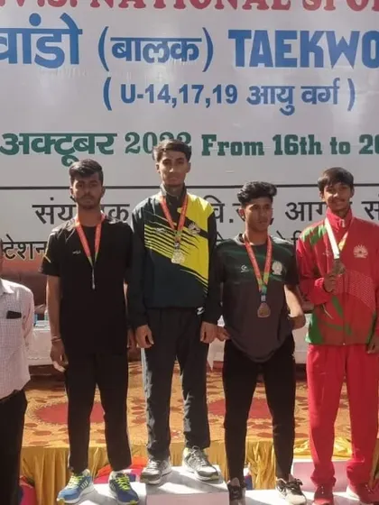 A full view of the podium at the K.V.S National Games. My student stands tall as the gold medalist.