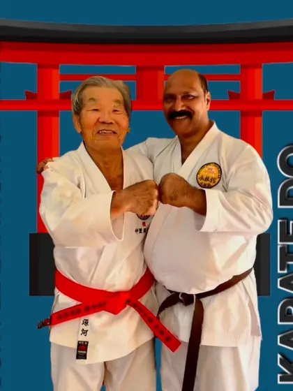 A moment of camaraderie with Hanshi Minoru Nakazato in front of a traditional Torii gate. This picture symbolizes the bridge between our dojo in India and the home of karate in Japan.
