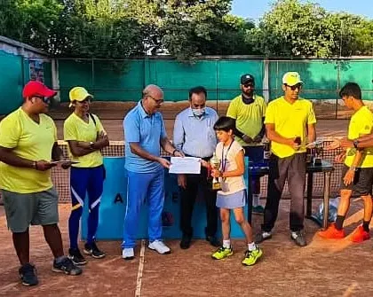 Advika, the winner of our Under-8 aptitude test, receiving her award. We celebrate every achievement to build confidence in our youngest players.