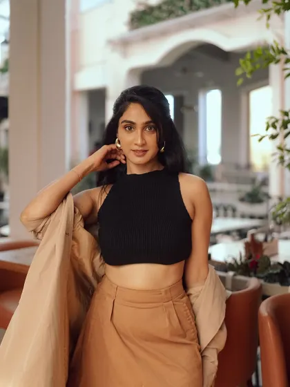A confident, direct-to-camera pose that sums up the cool, collected vibe of this series.