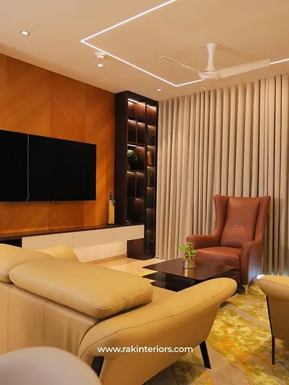 The same living room, highlighting the ceiling design with integrated strip lighting.