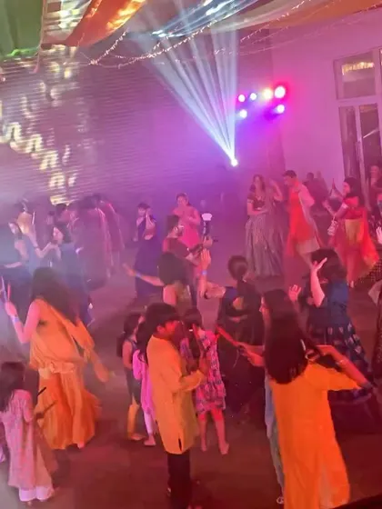 A colorful sangeet celebration in full swing. The mix of traditional outfits and high-energy dancing is always amazing to see.