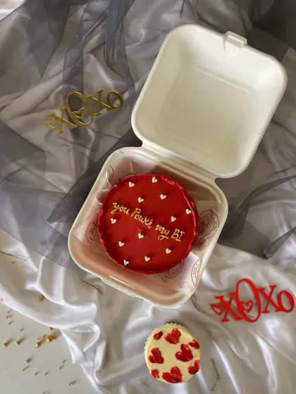 "You Power my BI." A nerdy and sweet message for a partner in the tech industry, showing that any personal joke can become a bento cake design.
