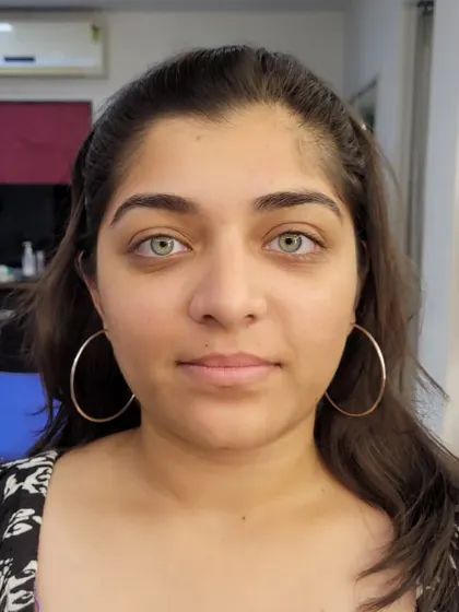 Before: A model with beautiful eyes, ready for a simple straight makeup application.