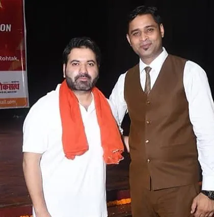 Our founder stands with a distinguished guest at the competition. We are proud to host respected figures from the arts community who come to support and inspire our young performers.