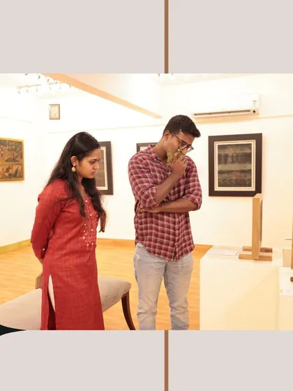 Visitors contemplating artworks, lost in moments of discovery and inspiration.