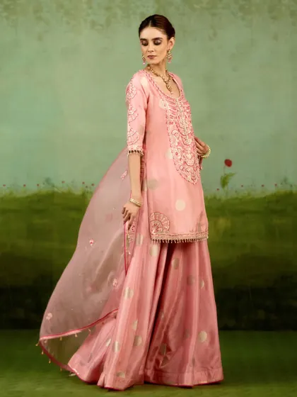 This extensive collection features a wide array of modern festive attire. From vibrant sharara sets and elegant anarkalis to chic jumpsuits and light lehengas, these pieces are curated for wedding guests and anyone looking for a stylish outfit for a special occasion.