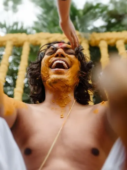 The groom's uncontainable laughter during a fun-filled Haldi. These are the real, unfiltered moments we strive to capture.