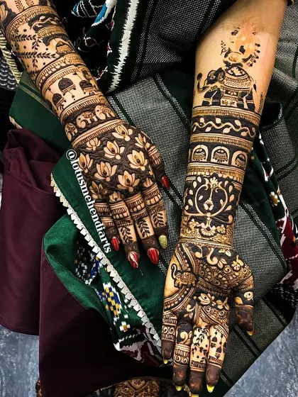 A unique design combining Ganesha, elephants, and lotus motifs, perfect for a bride seeking blessings and traditional beauty.