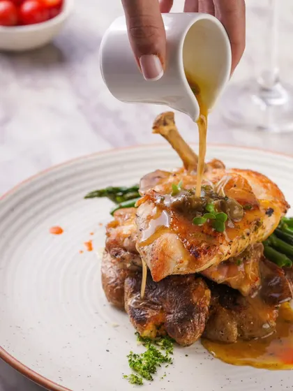 My juicy poulet, perfectly cooked and stacked on smashed potatoes with a side of green beans. A simple yet elegant main course.