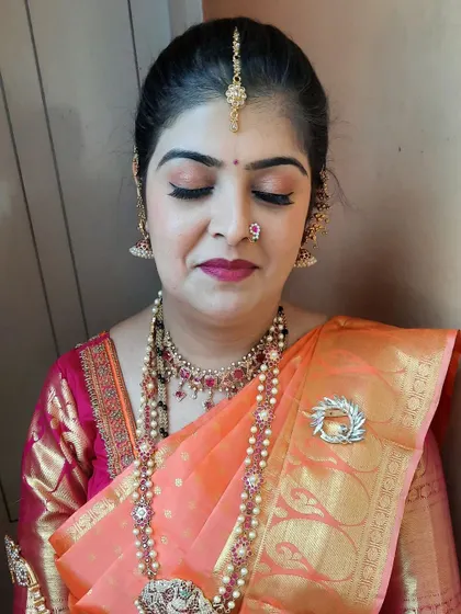 A final close-up on the makeup, highlighting the soft shimmer on the eyelids.