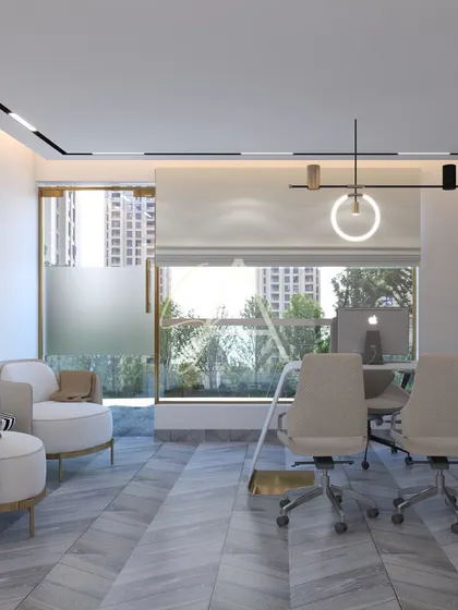 A bright and airy office cabin with a large window. The design uses a light color palette, chevron-patterned flooring, and minimalist furniture to create a feeling of spaciousness.