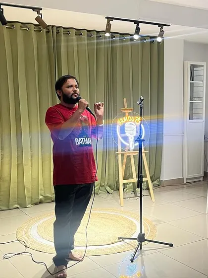 A comedian warming up the crowd at a "Namdu" comedy night.