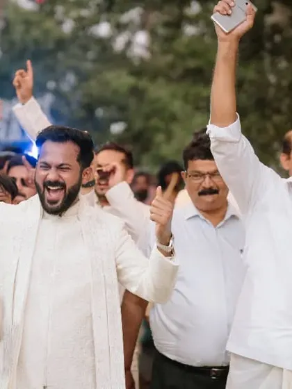 The groom and his family celebrating with full energy during the Baraat.