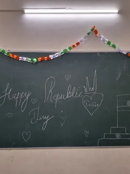 A blackboard decorated with "Happy Republic Day" and a drawing of the Indian flag. The children's creativity was on full display as they turned the library into a festive masterpiece.