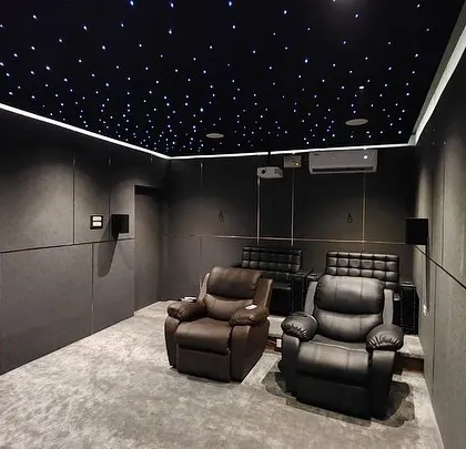 A duplicate of 391, this image again showcases the spacious and well-organized layout of this modern home theater.