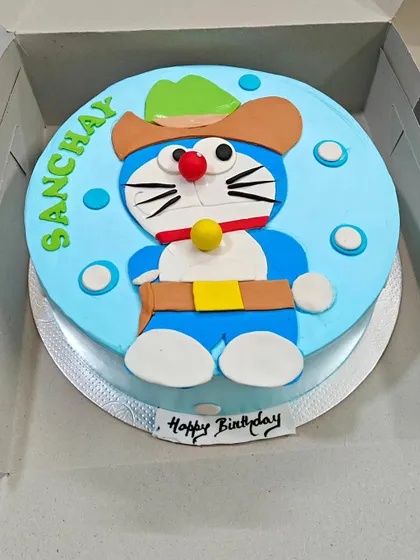 A fun Doraemon-themed chocolate cake, perfect for a fan of the beloved cartoon character.