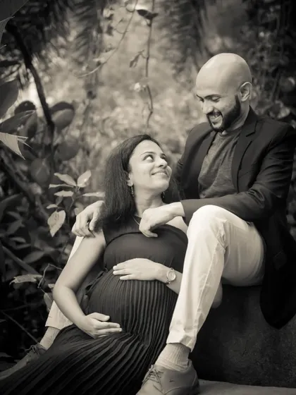 A black and white version of a tender moment. This edit emphasizes the emotion and connection between the couple, creating a timeless and artistic maternity portrait.