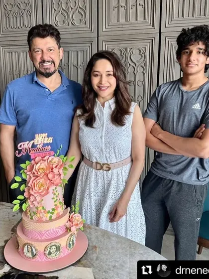 We were delighted to create this beautiful floral cake for the iconic Madhuri Dixit Nene's birthday celebration. Here she is, pictured with her family and our three-tiered creation featuring edible photos and handcrafted sugar flowers.