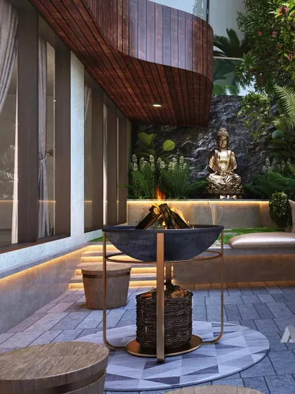 A tranquil corner in our luxury villa township project, Evara, in Igatpuri. We designed these outdoor seating areas with fire pits to be cozy extensions of the living space, perfect for enjoying the cool mountain evenings.