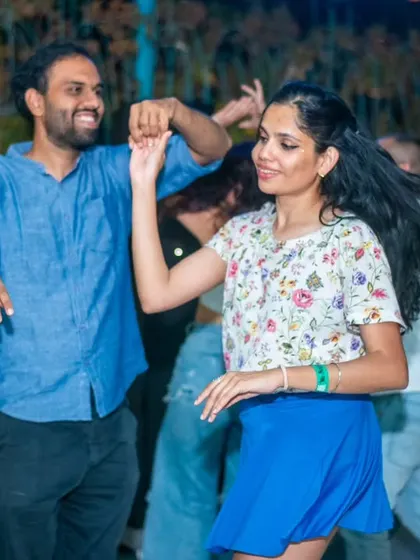 A dynamic spin with hair flying, capturing the energy and motion of a great Salsa song.