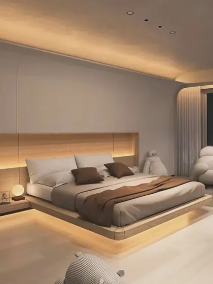 This render illustrates a minimalist "floating" bed design. The platform is recessed, giving the illusion that the bed is hovering. The wide, low headboard incorporates floating nightstands and soft backlighting for a clean and serene look.