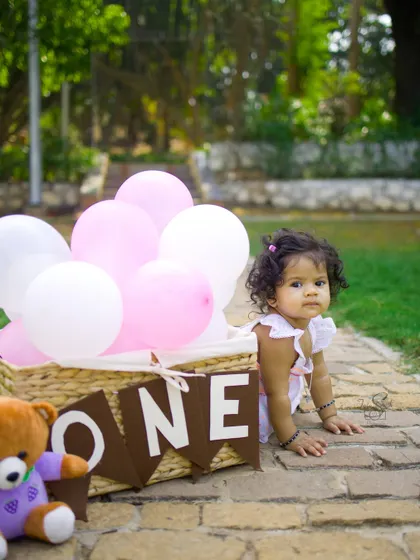 A determined look from the birthday girl. I love capturing the full range of expressions, from joyful giggles to moments of quiet curiosity.
