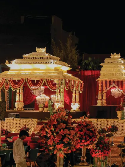 A side view of the Mysore Palace Mandira structures, showcasing the detailed canopies and chandeliers. Each element was designed to radiate divinity and opulence, creating a multi-layered visual experience for guests.