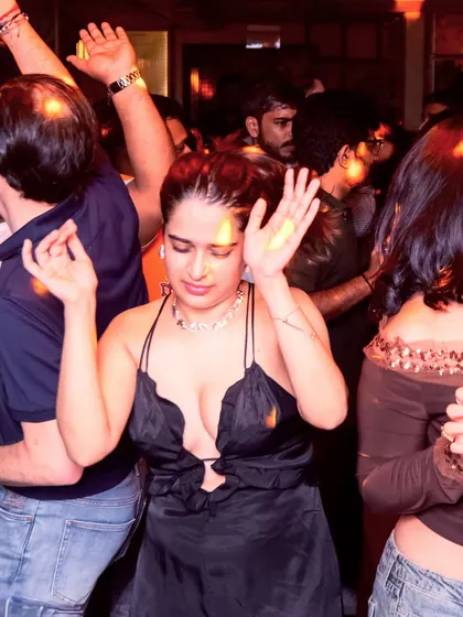 A guest lost in the music, dancing to the throwback anthems that define our VIBE CHECK nights. The energy was palpable.