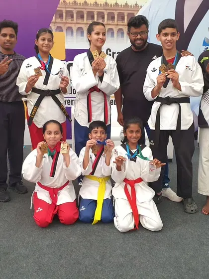 Our junior and senior medal winners at the Kukkiwon International Championship. We train students across all age categories for competitive success.