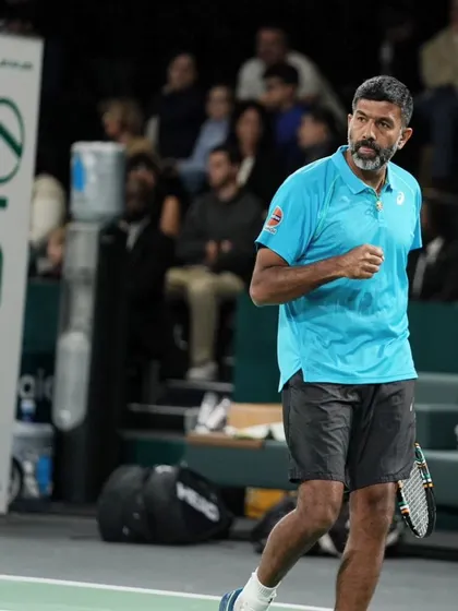 Focused and determined on the court at the Rolex Paris Masters. Mental fortitude is as important as physical skill.