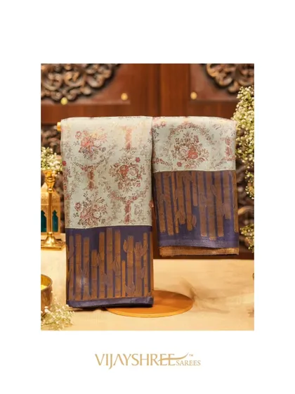 A beautiful Kanjivaram with delicate floral motifs and a stunning brass zari border.