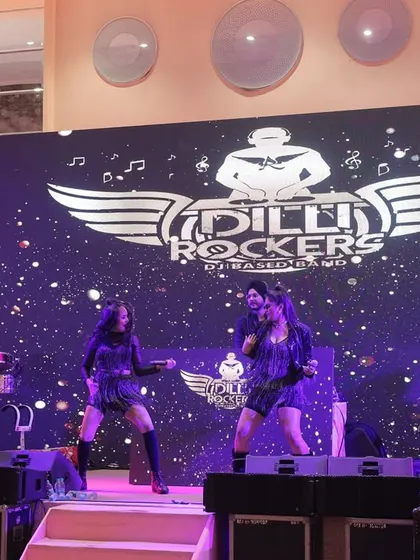 This is us, Dilli Rockers. A complete unit of multiple vocalists, percussionists, and a DJ, all in sync and ready to rock your event. We bring a coordinated look and a polished, high-impact show every time.