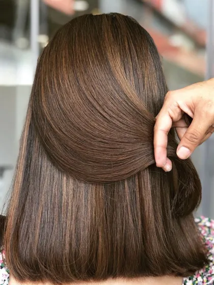 A beautiful balayage and bob haircut combination. The no-bleach color adds natural-looking dimension that perfectly complements the sharp lines of the cut.