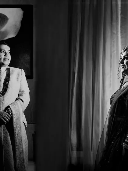 A creative black and white composition of the couple, Vaibhav and Shivya, capturing a moment of anticipation.